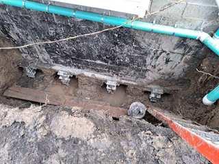 Helical Piers attach to the footer of the foundation and are drilled into stable soil. The stable soil supports the weight of the house and prevents further sinking and foundation damage!