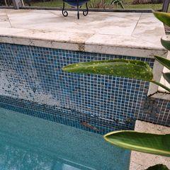 This homeowner was experiencing severe settlement to his pool deck. There were noticeable cracks in the tiles and concrete that needed attention.