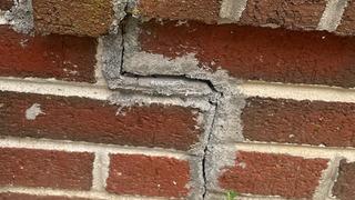 With these foundation issues you can also find cracks like this one  in the foundation. This indicates that your foundation is settling.