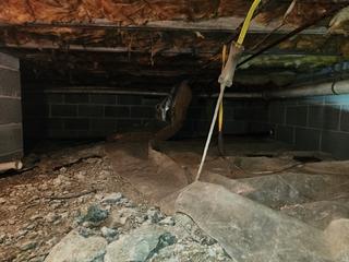 This crawl space had very high levels of moisture that was causing wood support beams to weaken and musty odors to arise.