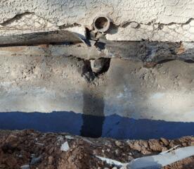 One common factor in some concrete stem walls is that there is usually a water leak, as shown in the picture. Grass close to the home's foundation can be another influential factor causing the area to retain more water than normal and eventually oxidize the stem wall.