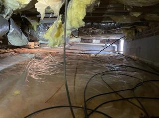 This crawl space was moist, humid and filled with musty odors.