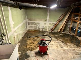 Yikes! This basement was suffering from some very severe water damage.