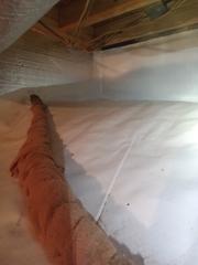 After all debris was removed and drainage matting was installed, this crawl space received a CleanSpace encapsulation to protect from moisture, humidity, and winter drafts.