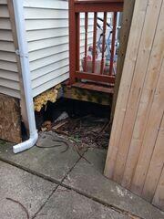 The crawl space under this porch was left with zero support.