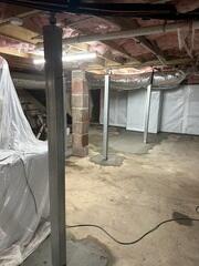 SmartJack Support Posts permanently stabilize the structure and lift the floors above to their original position.