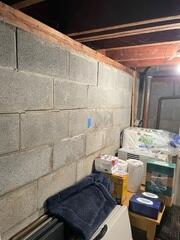 Settlement and shifting of the soil beneath your home can lead to stair step cracks like the one shown above.
