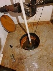 Replacing a Sump Pump and Waterproofing a Basement in Manchester, MO