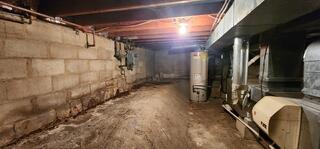 This is the crawlspace prior to any work. you can see the water damage on the walls and it was overall very damp.