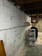 This house had a horrible foundation crack where you can visibly see how the wall is bowing inward, which can be very problematic if this issue isn't addressed.