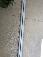 The original channel drain on the pool deck had lost its effectiveness in diverting water away from the home.