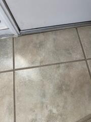 Cracks like these in floor tiles are common indications of foundation settlement. Sometimes the cracks are a symptom of a much larger problem.