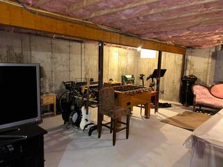 This was the basement before any finishing. It needed a fresh upgrade.