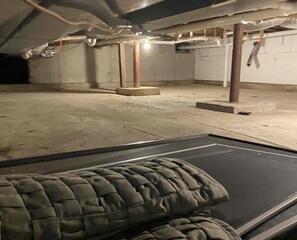 This was the crawlspace before any of our waterproofing products were installed.