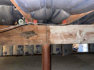 Here you can see that this home has sagging/bowing floors.