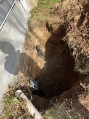 The final push piers have been driven under the footer of the foundation. They are ready to be covered back up with dirt.