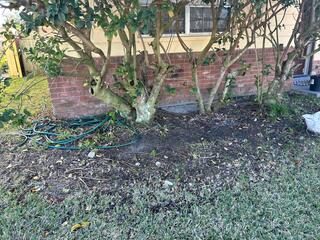 During rainstorms, this area around the home experienced major flooding, leading to water intrusion inside the house and exerting pressure on the foundation.