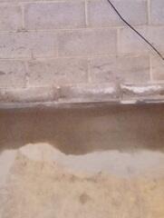 Our crew expertly covers the trench with cement making sure it is even and smooth.