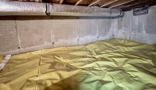 These Mineral Deposits on the walls are evidence of water leaking into the crawl space.