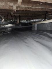 The crawl space was encapsulated with our SilverGlo insulation boards and CleanSpace vapor barrier. Thus, providing the ultimate protection against moisture, humidity, and cold drafts.