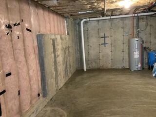 This basement was getting water seepage in the basement through the walls and floors and needed a permanent solution.