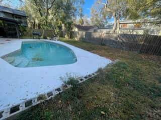 The homeowner had reported significant flooding in the backyard of his home and had resorted to using cinder blocks around the perimeter as a temporary solution to redirect the water away from the pool.
