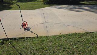 This section of the homeowner's driveway had settled and cracked significantly, prompting understandable concerns about its deteriorating condition.