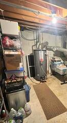This basement was getting water seepage through the walls and floors and needed a proper sump pump/drainage system.