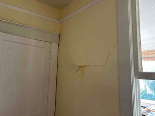 A significant sign of foundation issues for the homeowner was the appearance of cracks in the interior walls of the home.