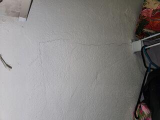 The homeowner was alarmed by the cracking patterns along the interior walls of the garage, raising concerns about foundation issues.