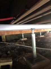 SmartJacks are made of galvanized steel which is corrosion-resistant, and a new permanent fixture to this home's crawlspace.