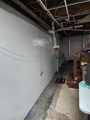The CleanSpace Wall system was installed to help seal and protect the basement walls from any moisture that tries to seep through. Made of 20-mil thick, 7-layer polyethylene, this is the strongest vapor barrier on the market!