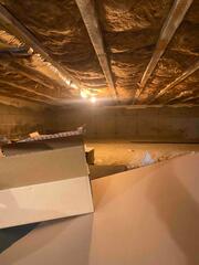 Water damage is visible on the left walls, so moisture was clearly an issue in this space.