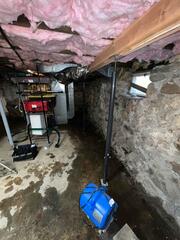 This basement had old, temporary supports that were not doing anything to support or stabilize the floor and the entire home above.