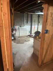 James's basement foundation wall started leaking water, which is when he called Frank's.