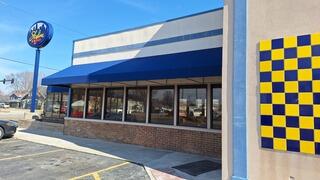 Here you can see severe fading in the colors.  This is common on full-sun substrates.  Repairs were made, and multiple coats were used to achieve great curb appeal!  Stop in for some great food, and enjoy the after pictures in person!