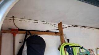 The crack around the top of the basement and garage walls is concerning!