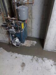 This French drain is designed to be installed below the floor slab. This positioning keeps the drainage system out of the "mud zone," where drains are prone to clogging.