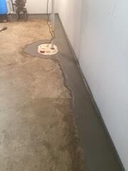 Our crew installed a full waterproofing solution to combat this homeowner's leaking walls.