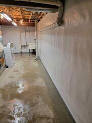 Our crew replaced this homeowner's clogged drainage system with our patented WaterGuard drainage.