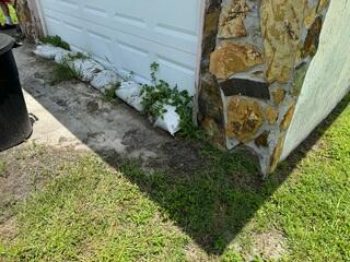 Rainwater would frequently collect around the perimeter of the garage and seep inside, posing a major problem for the homeowner.
