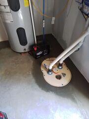 With the TripleSafe sump pump installed, this homeowner has 3 levels of protection against basement water!