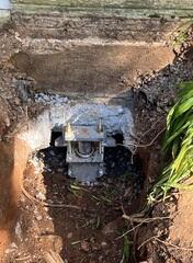 Steel Rods are driven hydraulically under the footer and will stabilize the foundation.