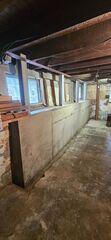 Our crew came in and installed a wall replacement to combat this homeowner's crumbling foundation wall.