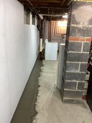 Our crew installed a new drainage system as well as our patented inorganic BrightWall panels in this homeowner's basement.
