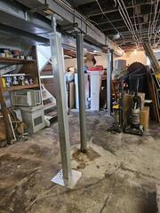 Our crew installed multiple SmartJacks to keep this basement structurally sound.