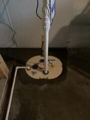 Our crew installed our SuperSump Plus system into this homeowner's basement.