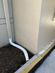A concerning sign for the property owners was the appearance of cracks in several areas of the building's exterior walls.