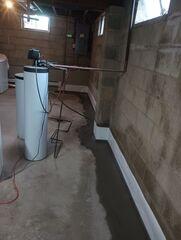 Our WaterGuard subfloor drains are almost completely concealed except for the wall flange.