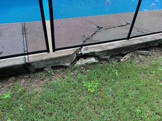 Water eroded soil away.
